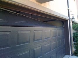 Fixing Garage Door Panels (Helpful Info, Videos and Cost)